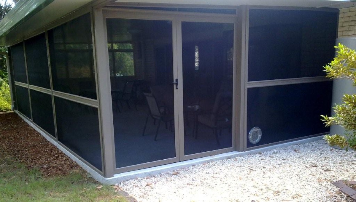 After — patio enclosed with insect screens
